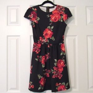 black fit & flare dress with rose pattern